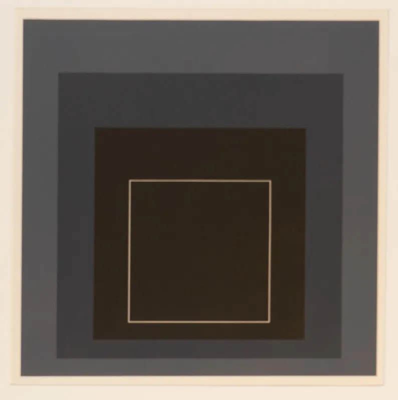 Rectangular colour study in greys with a white line around the inner square.