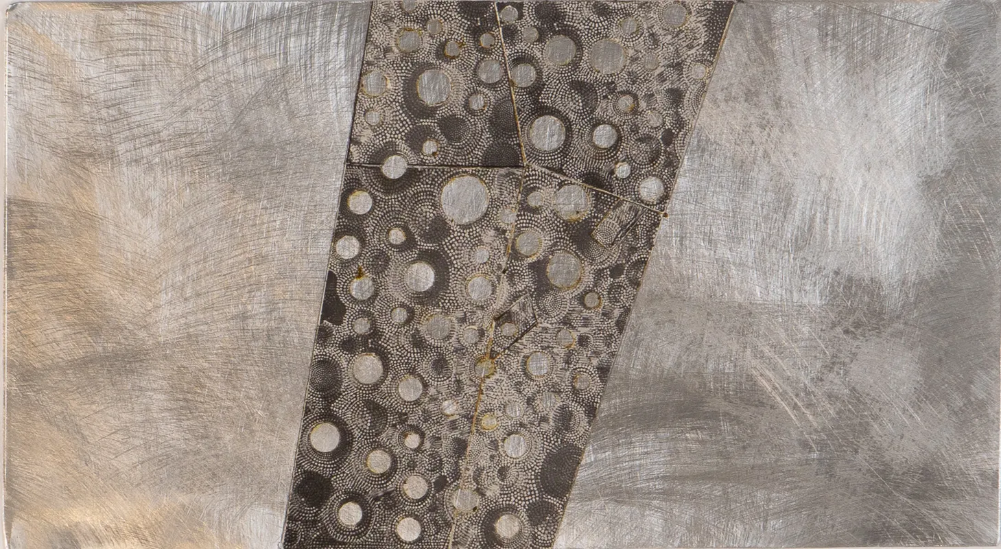 maquette of mural with nails.