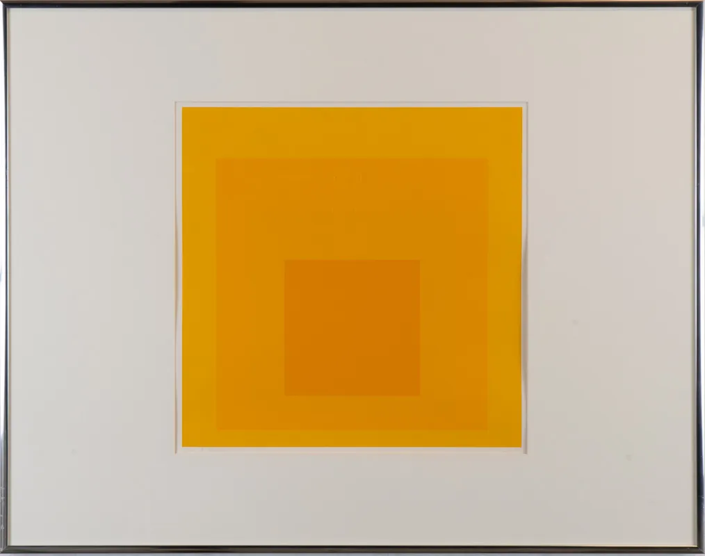 Concentric squares, weighted towards the bottom, with visual interactions between the colours. Primarily yellow and orange.