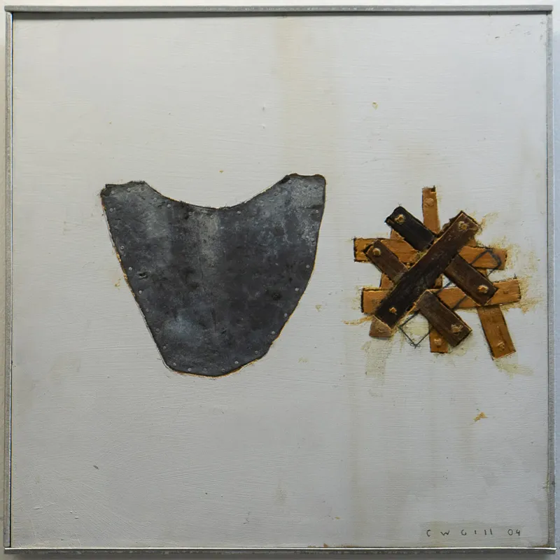 A grey breastplate on the left; a small barricade in brown on the right. Both against a white background.