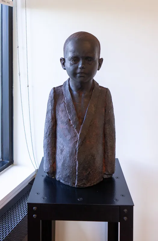Torso of a young boy.
