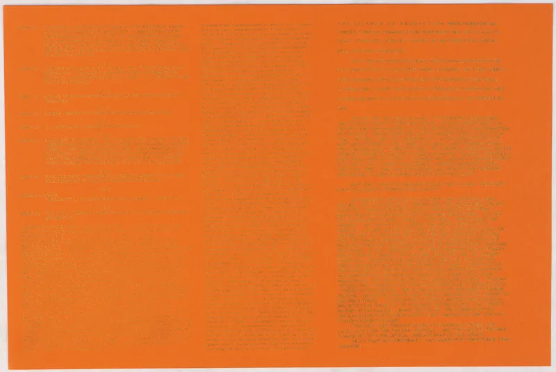 faded black text on orange paper 