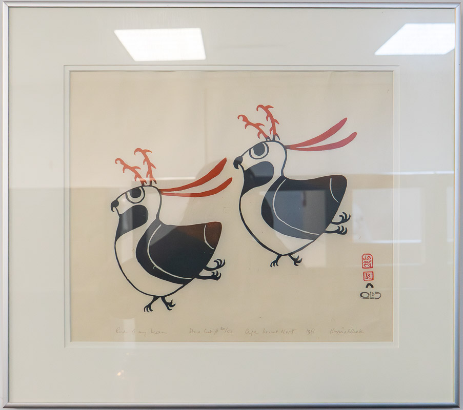 Two birds with antlers