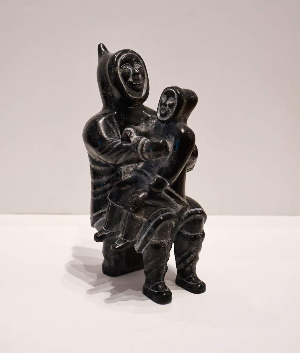 Man with Child on Knee