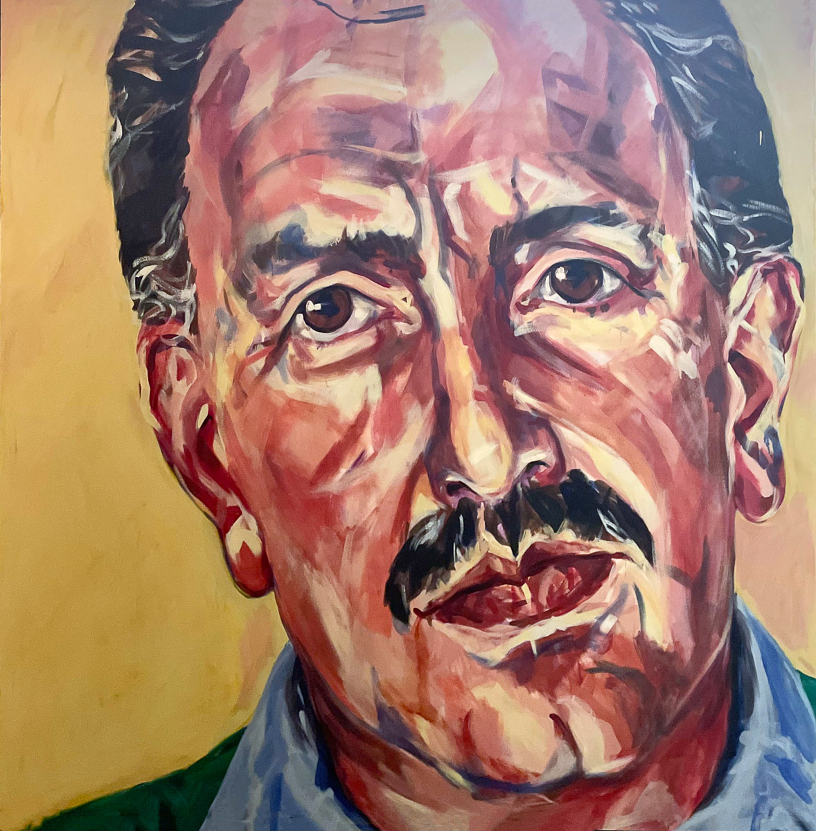 Close up portriat of a man's face in rough patches of colour.