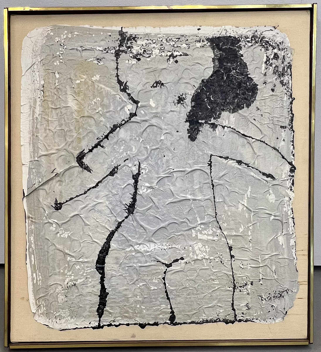 Outline of a girl's body in black and grey. The paint has been liftted off a different surface and applied unevenly to the canvas.