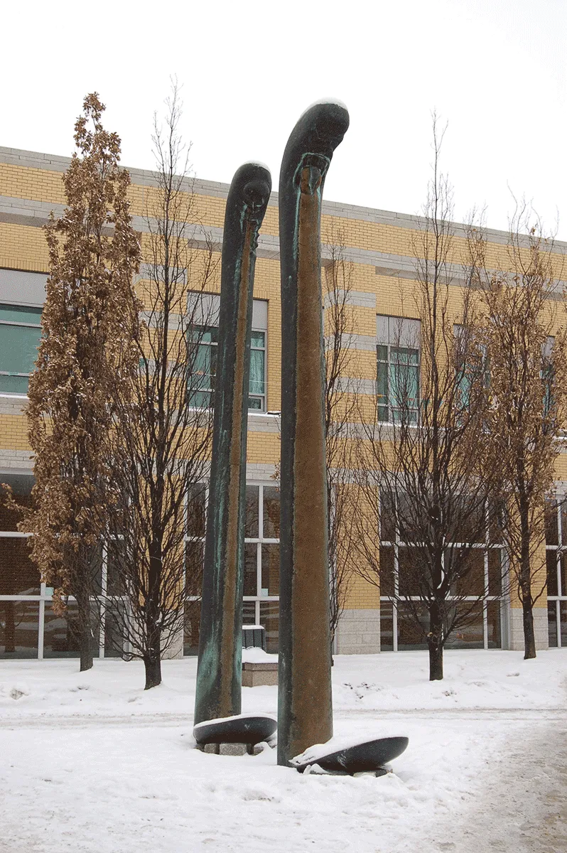 Two anthropomorphic phallic columns with integrated fountain.