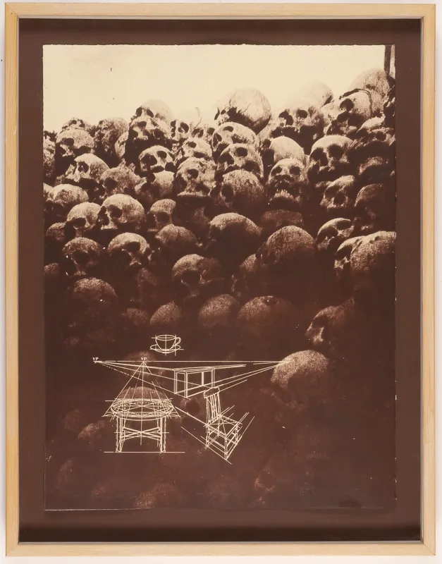 Mnochrome print of human skulls in a pile with perspective schema drawings in white on top.