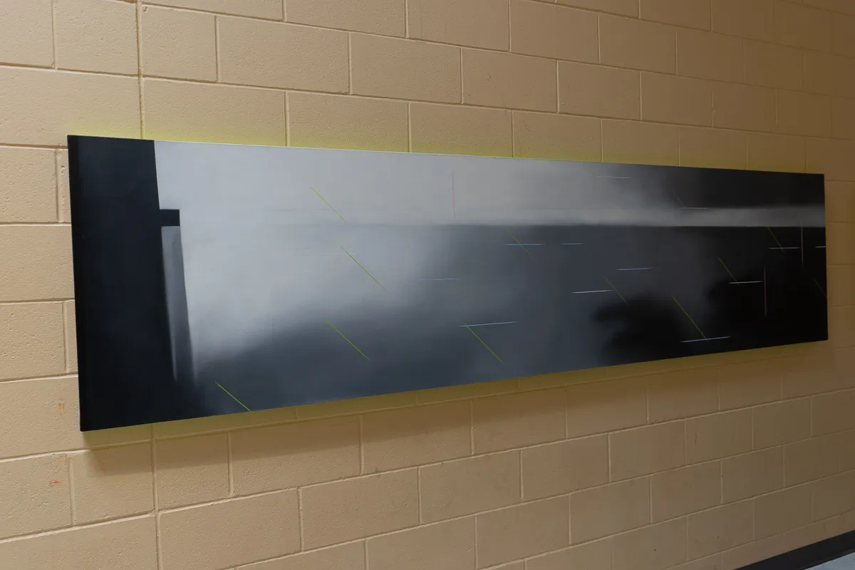 Long abstract painting, primarily white and black.