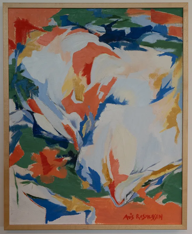 Abstract blotches in orange, white, and green. Reminiscent of an unmade bed.