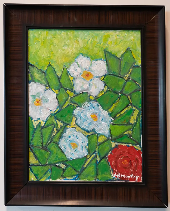 White and red flowers on green background.