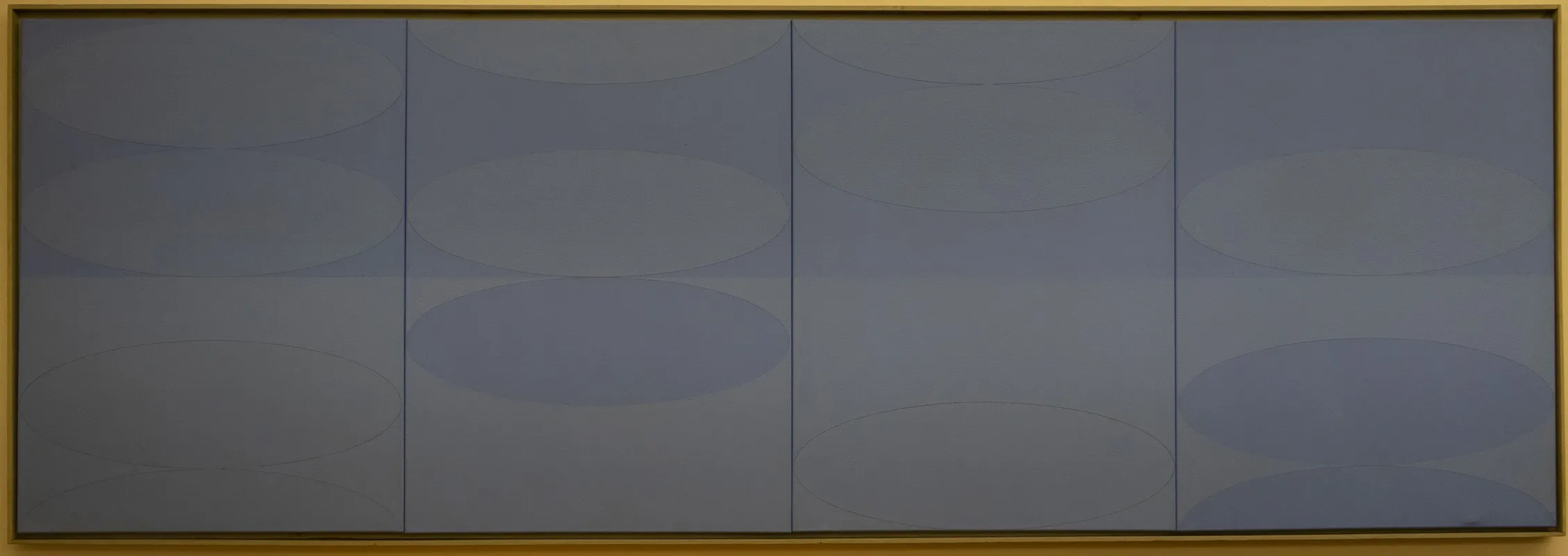 A bluehorizontal canvas, divided into two rows of four, with various ovals inset into most of the subdivisions.