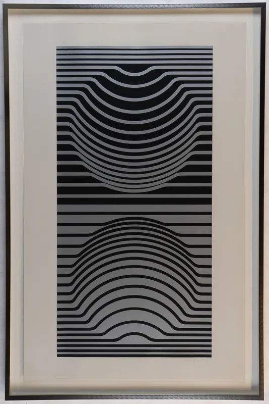 Two stacked squares with circular graphic patterns in them in black and silver/white.