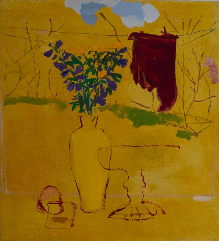 Floral arrangement and hanging laundry on a predominantly yellow background.