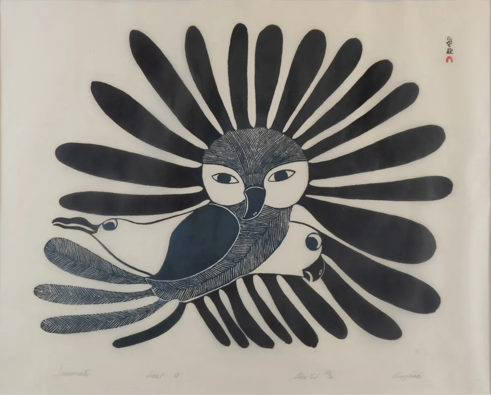 An owl with two additional bird heads coming from the sides. 