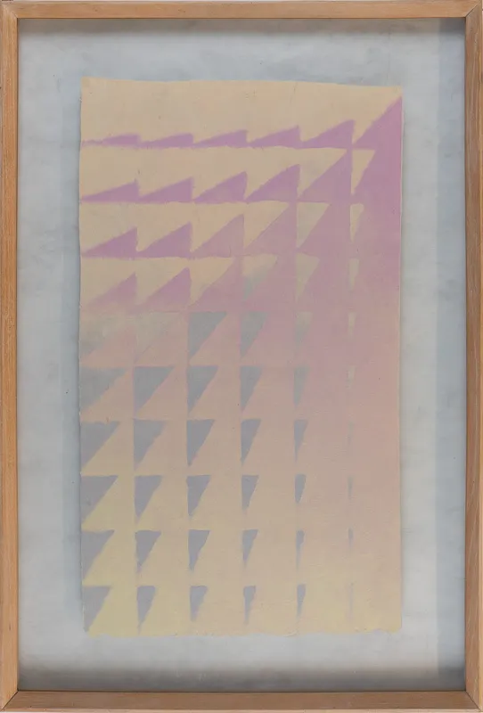 A pattern of triangles in pastels.