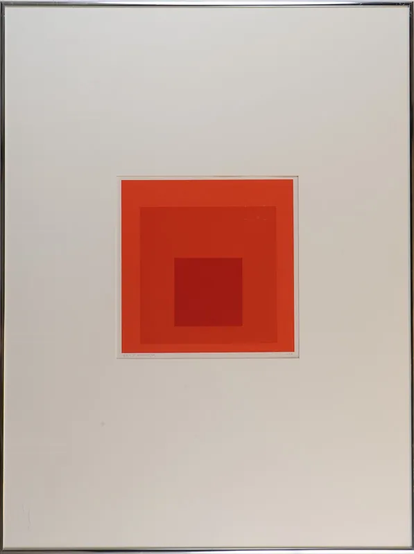 Concentric squares, weighted towards the bottom, with visual interactions between the colours. Primarily orange and red.