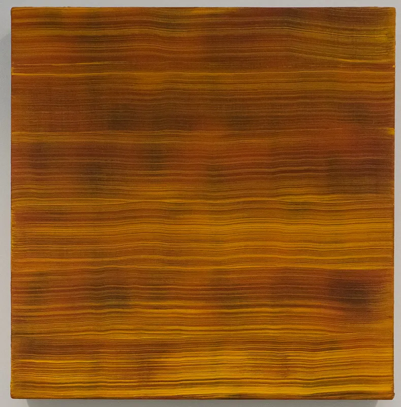 Painting of horizontal wood grain in brown and orange.