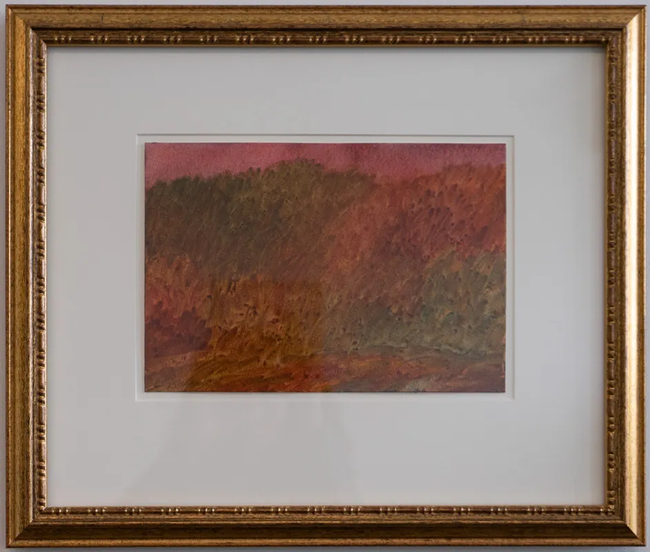 Landscape in muted green and orange/red.