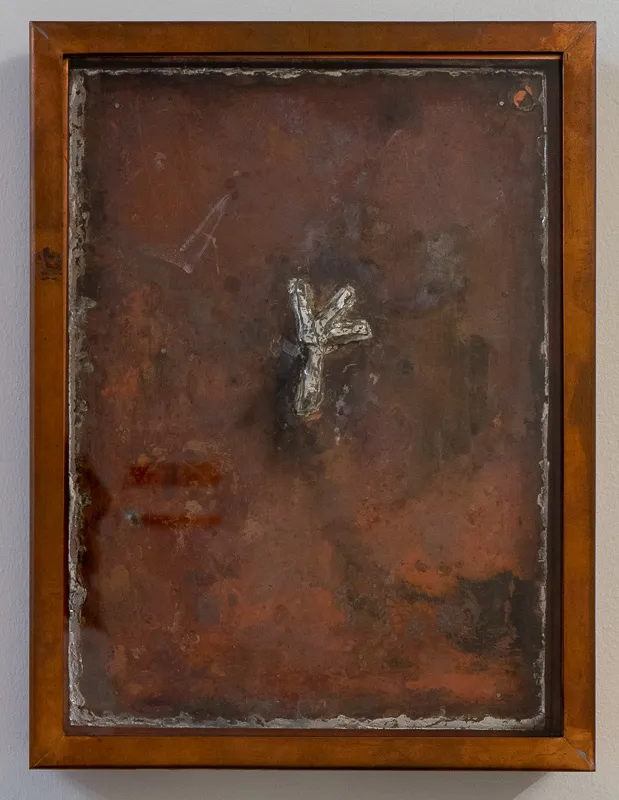 Soldered tri-armed twig on copper ground.