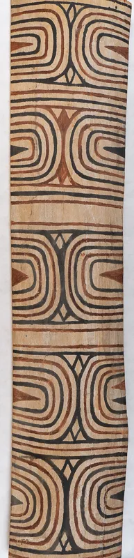 Wooden shield decorated with black and red lines.