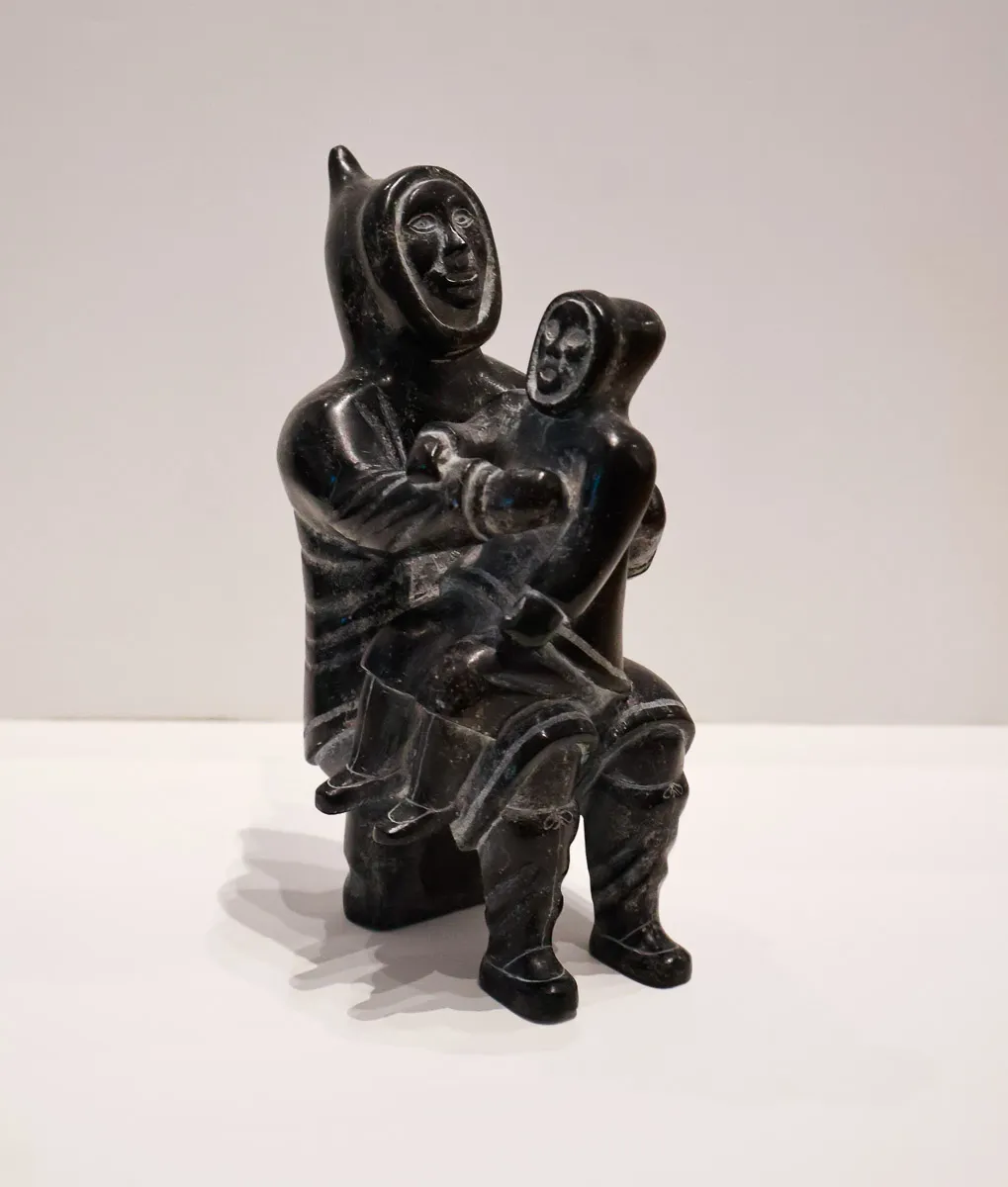 Man with Child on Knee